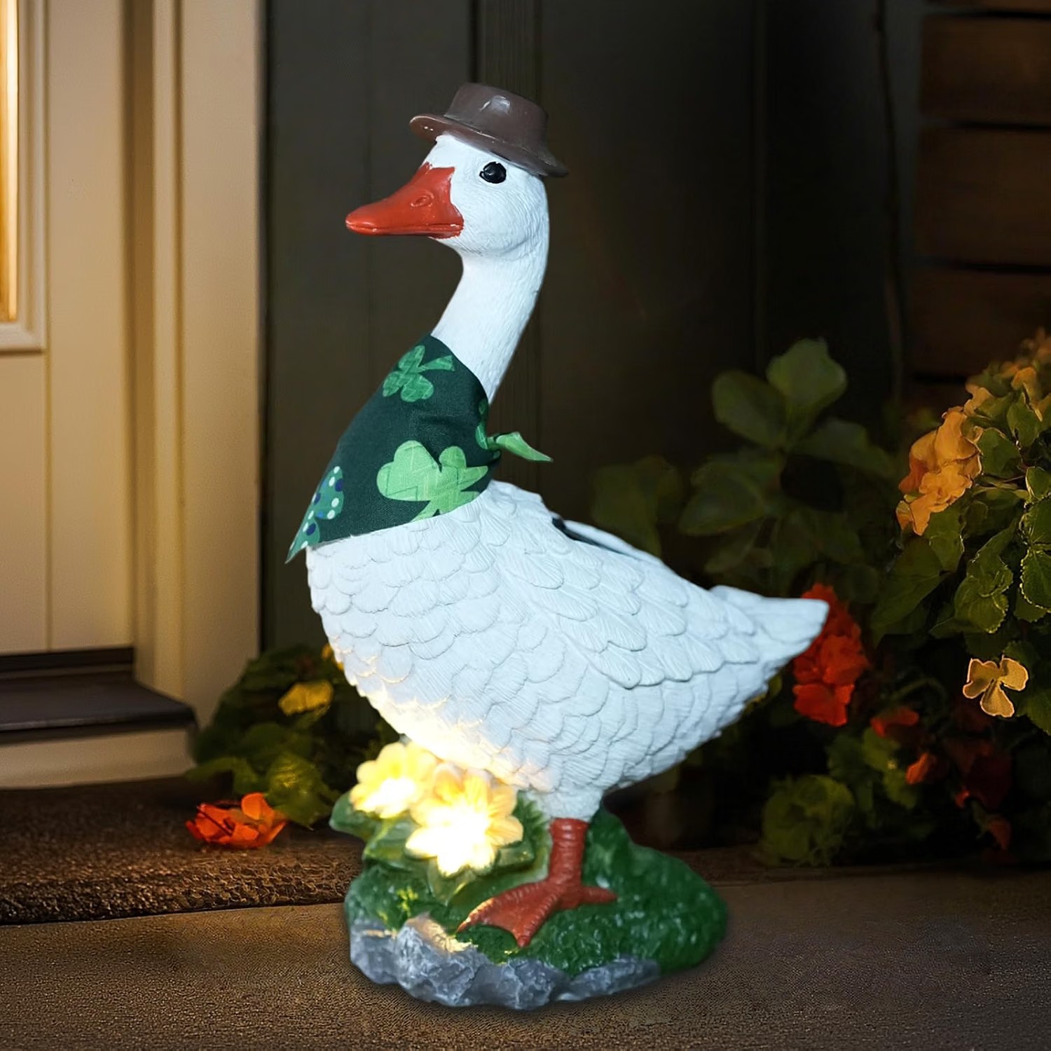 719hwr8ggEL._AC_SL1500_ 10" Solar Porch Goose Garden Statue with Glowing Flower - Image 1